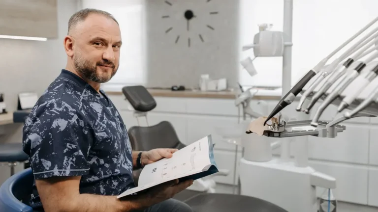 dentist consulting patient chair