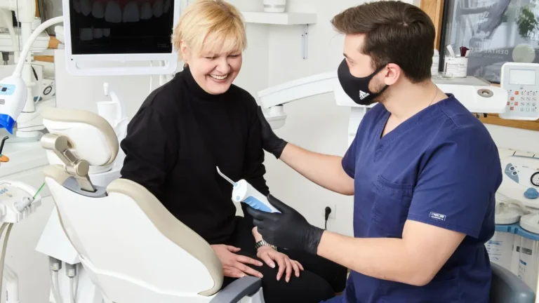 dentist consulting patient chair